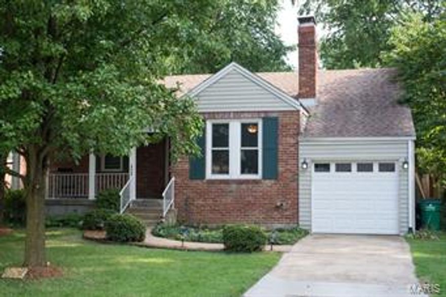 Sparkling bungalow in quiet, sought-after neighborhood in Webster school district. Gorgeous custom kitchen, fabulous hardwood floors and high-efficiency upgrades! This one is a charmer and is move-in ready! You'll love the historic details and you'll appreciate the new windows, systems and the 97%-efficient furnace - with humidifier and air cleaner. Utilities are an amazing $130/month!
The large, covered front porch is a great place to sit and chat with the FANTASTIC neighbors. The big, shady backyard is ideal for grilling and relaxing. Full height basement has a bright spacious laundry area as well as plenty of storage and a partially roughed-in second bath. Some walls have already been framed for insulation - with a few finishing touches a new homeowner could double the living area! The best part may be the location - convenient to both 40 and 44, and 2 min to downtown Webster. Homes on this street are rare - don't miss it!
