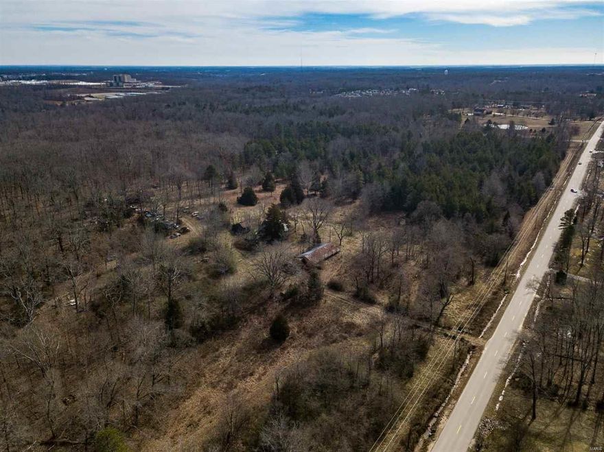 Prime commercial or residential property just off Hwy 67N with great visibility. NE corner of property comes within 300' of Motel 6 property and lots of CR 441 frontage. Also has 20' that runs to Hwy 67N West Outer Road. Property has 12" and 6" main lines ran all across it and Pike Creek Sewer already ran all across it and electric all along frontage on CR 441. This property is ready for commercial or residential development.