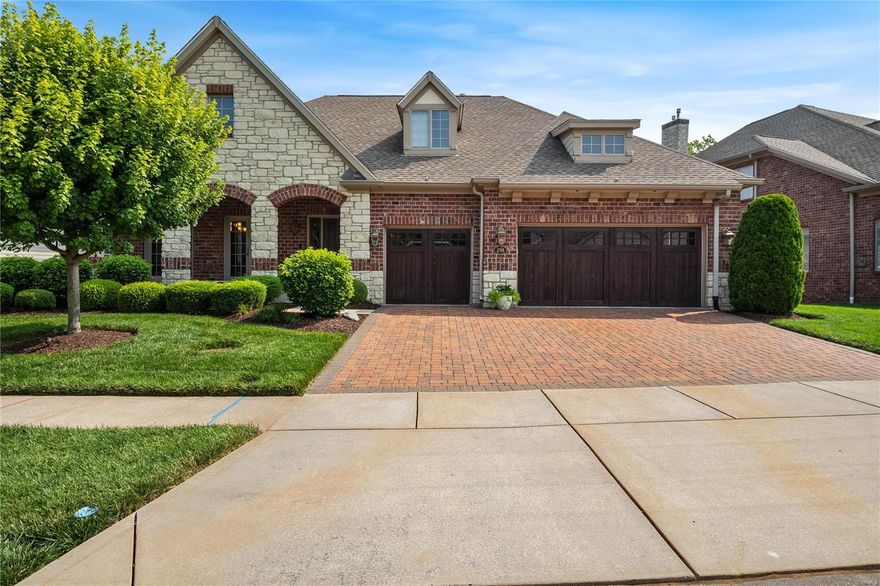 Luxury villa living on the premiere Meadowbrook C.C. #6 signature hole. This gem is nestled on an oversized lot w/fabulous views, set back for ultimate privacy. Full brick elevation w/a covered front porch & private 3 seasons room leading to the lower paver patio. Gorgeous hardwood floors, 3-piece crown molding & fluted casements welcome you home & extend throughout the main living areas. Beautifully appointed great room w/gas fireplace & gorgeous wall of windows opens into the breakfast room & chef's kitchen. Custom cabinetry w/molding, Thermador appliances & granite counters are just a few of its incredible features! Owner's suite overlooks the golf course w/huge walk-in closets, double vanities, soaking tub & separate shower. An entertainer's delight, the lower level hosts an ensuite bedroom & large rec room w/wet bar, 2nd fireplace & drop down theatre screen. Don't miss the private executive den, opulate formal dining room & oversized 3 car garage with epoxy floors & custom trim! Some Accessible Features