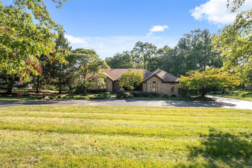 Once you step inside this spectacular Ranch, you will want to call this house "home." The wonderful all brick home is nestled on a private acre lot backing up to a serene wooded landscape. One level living boasting a bright open floor plan w/ 3 beds, 3.5 baths, and over 5,000 sq ft of total living space. This beautifully maintained home on a premium cul de sac lot is a rare find in Chesterfield. Vaulted ceilings, skylights, & windows throughout make this home light, bright & welcoming. The kitchen has SS appliances, newer double ovens & granite countertops, & opens to an inviting four season room. The spacious primary suite includes a sitting area w/ a bay window, a great place to relax, read a book & enjoy nature. The large deck offers a magnificent view of the fully landscaped lot including zoysia grass, gorgeous mature trees, & a Chinese garden. The walk out LL is a haven for entertaining including a wet bar, large media room, work out area, and full bath. Additional Rooms: Sun Room