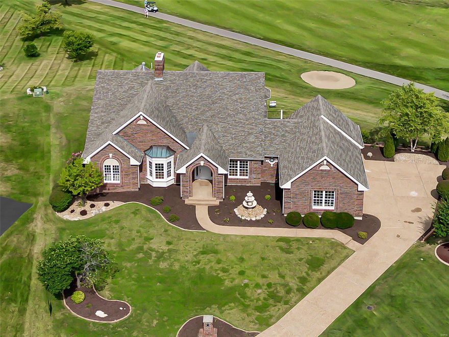 Beautiful atrium ranch in Whitmoor CC situated on a half-acre cul-de-sac lot offering incredible sunset views of the 15th Hole of Whitmoor's North Course! This home has been remodeled from top to bottom. The private main floor Home Office offers a luxurious place to work with French doors, built-in bookshelves and stunningly refinished coffered ceiling. The vaulted Great Room features a custom ventless gas fireplace with new mantle, impressive trim work & granite surround. Large main floor Master Suite with bay window overlooks the yard & course. Master Bathroom has been completely remodeled with top-of-the-line finishes and is a true show stopper. Finished walk-out LL with large entertainment area, wet bar, media/living room, rec room, 2 BRs and 2 full baths. New job-finished hardwood flooring throughout. Amazing Kitchen with quartz tops, Bosch range, custom cabinets/tilework. Don't miss this home in top rated Francis Howell Schools with a million dollar view.