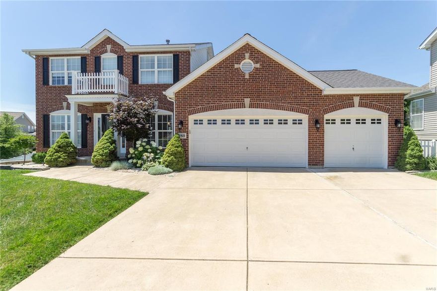 This beautiful home will check off every box on your wish list! For starters you will love the stately full brick front, professional landscaping and cul-de-sac lot! The attention to detail shows in every room from the full view leaded front door with sidelights to the gorgeous coffered ceilings in the dining room. The kitchen is a true entertainers dream with beautiful hardwood floors, upgraded 42 cabinetry, custom tile backsplash, large center island, built in refrigerator, spacious pantry with custom shelving, and a decorative brick accent wall. The light and bright family room with 5 window bay, custom built book cases, 9 ft ceilings and wood burning fireplace. The partially finished lower level has a large rec room with a dry bar and full bath. Out back is a low maintenance deck with a gas line for BBQ and an in ground sprinkler system. Plus an oversized 3 car garage with hot/cold water. Central vacuum and zoned heating/cooling. Don't miss out on your chance to call this one home!