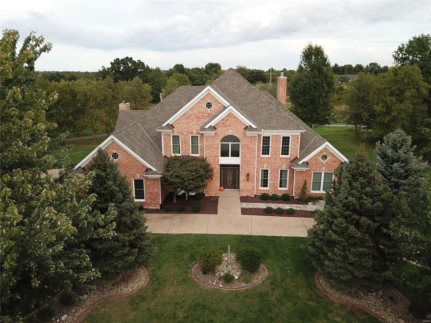 Simply majestic 1.5 story home on magnificent .86 acre cul-de-sac lot backing to golf course in Whitmoor Country Club. Showcases pristine condition, unparalleled distinction, dramatic open floor plan, extraordinary recent upgrades over $260K, composite deck, oversized 3-car side-entry garage, handsome circle drive, architectural roof '17, 3 fireplaces, 5,002 total sq ft! Step thru the door & be awe-struck w/impeccable detail… 3,000 sq ft of beautiful yet durable strand hand-scraped bamboo wood floor/updated basebrds, stylish neutral decor, crown molding galore, wall of windows, executive millwork/built-ins, soaring 2-story entry/great rm, impressive T-staircase/distinctive curved railing, main floor laundry, tinted glass barn drs, amazing renovated luxury master suite. Perhaps everything on your wish list w/custom gourmet kitchen, white cabinets, Quartz counters, premier stainless appliances, expansive island, built-in coffee bar. Finished LL w/huge rec rm. Wow! Additional Rooms: Mud Room