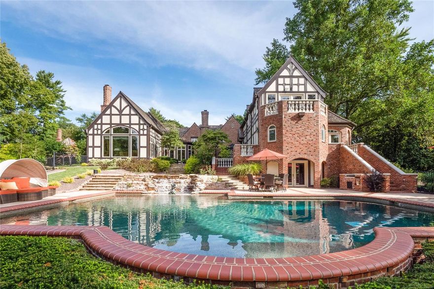Welcome to Galloway Manor, a private English Tudor Estate built in 1929, featuring modern amenities & renovations along the way. Boasting 9,000+/- sq ft of living space & 4.37 landscaped & manicured acres. Incredible 1.5 story home originally designed by famed architects Klipstein & Rathman. This gorgeous estate offers main floor master wing complete with massive bathroom fit for King & Queen. Tudor Hall is perfect for entertaining large crowds. Formal Dining room. 3 half baths. Large 2 story great room w/ wet bar. Chef's kitchen with Miehle, Wolf, & Subzero appliances complete with double ovens & dishwashers, large dining area. Vaulted Hearth room with tons of windows. Upper level offers 4 bedrooms, 3 full baths, & screened in porch. Upper level private office with balcony. Walk out Lower level with bar/kitchenette, state of the art media room, & 1/2 bath. Grounds feature a tennis court, saltwater pool, large outdoor fireplace, terraced gardens & paths throughout the lush vegetation.