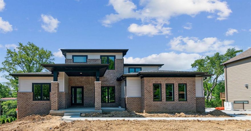 Another new custom home is coming soon on tree-lined Forsythia Lane in Ladue Schools. Beautiful  .46-acre walkout lot, with several other new homes either completed or currently under construction on the street.  1.5-story contemporary design with five bedrooms, 4.5 baths, and loaded with upgrades with approximately  4900 square feet of finished living space on three levels.  You will enjoy a gourmet center island quartz kitchen, luxury main floor primary suite, wood floors, and finished lower level with 5th bedroom, bath, rec room, bar, playroom and media room. The upper level includes three additional bedrooms, two bathrooms, plus a loft/playroom. Other amenities include a gas cooktop, double oven, walk-in pantry, and stainless appliances, zoned HVAC, sprinkler, and wiring for a security system. Outstanding close in location convenient to highways, airport, hospitals, Clayton and both public and private schools.  Wonderful opportunity to custom-build your new home right here.