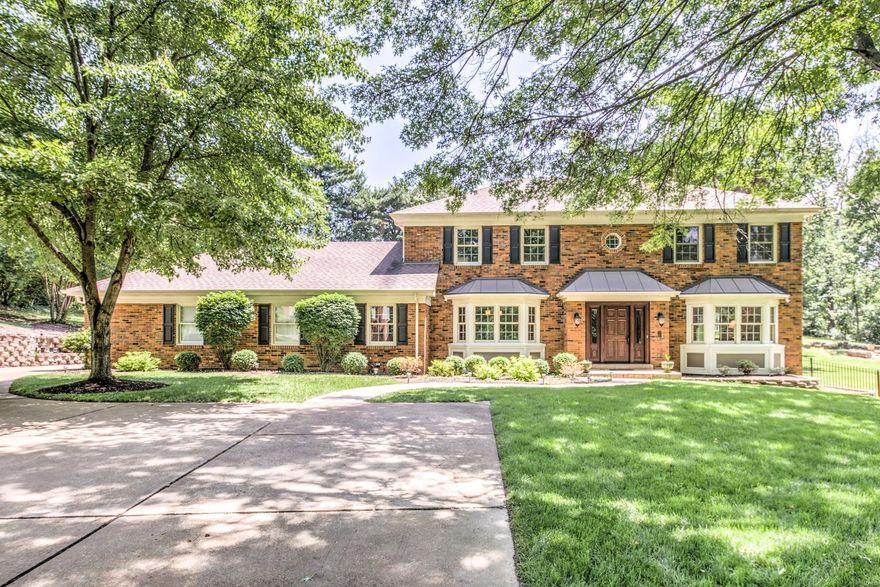 At over 4,000 square feet, this 4br/3.5 ba Town and Country estate is stunning! Sitting on a 1.17 acre lot this home features a brick exterior, professional landscaping, an enormous back yard that includes a large in-ground pool and wrap-around deck. Exterior also features ample parking and a large 3 car garage. The main floor of this fantastic property features a well-designed open floor plan, formal dining room, living room (w/fireplace), large laundry room and a family room that includes fireplace and plenty of room for entertaining. The eat in kitchen is gorgeous and includes custom cabinets, stainless steel appliances, chilled wine storage, large center island and granite countertops. The 2nd floor features 3 spacious bedrooms and an expansive master that includes a large walk-in closet, office, deck and ensuite (w/granite countertop, custom cabinets, dual vanity and luxurious stand-up shower). A partially finished lower level includes wet bar, entertaining space and storage area. Additional Rooms: Mud Room