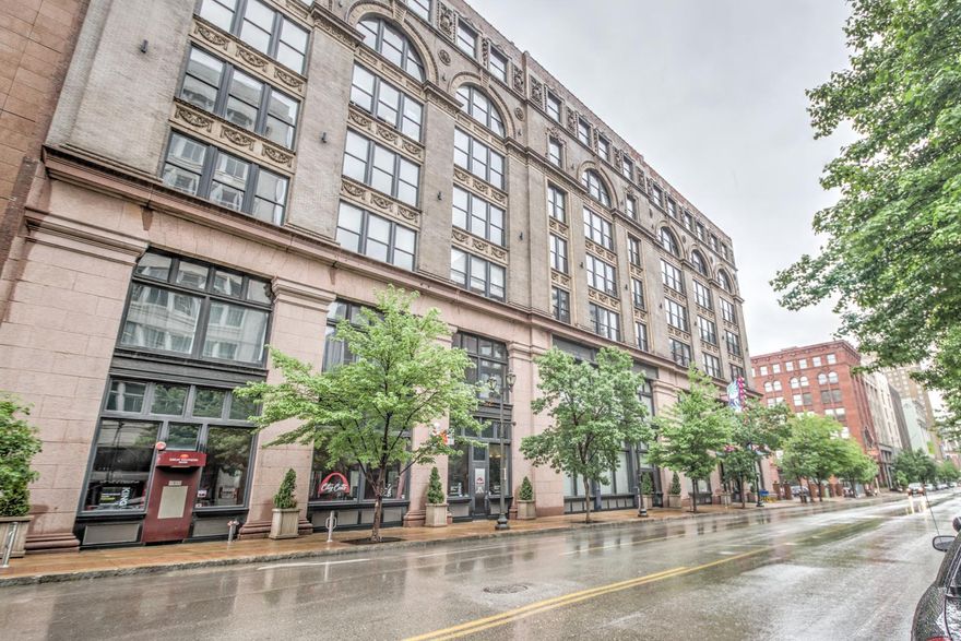 Fabulous 2BD Washington Avenue loft features tons of amenities and high-end finishings and is move in ready. Located in the gorgeous Lucas Lofts, this beautiful property features impressive architectural details including the tall ceilings, exposed wood beams and concrete floors. Main living area features an open floor plan and includes a spacious entertaining area with huge windows bring in tons of light and skyline views. A cooks kitchen has custom 42” cabinets, a farmhouse sink, stainless steel appliances, granite countertops and a breakfast bar. A dining area features plenty of exposed brick and a custom lighting feature. A spacious master bedroom has lots of closet space, ceiling fan and features an ensuite that includes a beautiful custom vanity. Home also features a laundry area and second bedroom/office. An underground garage with 2 parking spaces, storage unit and roof top pool round out this amazing condo. Monthly fee includes water, trash, sewer, cable and internet. Location: City