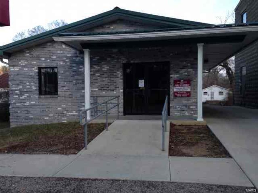 REDUCED! Such a great buy with endless business opportunities!  This 921 square foot heated/cooled commercial building was formerly used as a bank.  The building next to it is also included.  The property is turn key ready and would be perfect for your new business.  

Both of the buildings are currently rented. Location: City, Corner Location