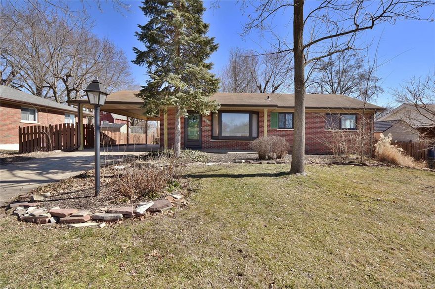 Prepare to fall in love with this terrific 2 bed/1 bath brick predominate ranch residence! It is ready & waiting for you in Move-In Condition. The long covered front porch welcomes you Home & into the inviting open floorplan with a spacious living room that includes a sunny bow window with bench. The chef in you will adore the large eat-in kitchen & adjacent dining room boasting ample cabinetry, decorative glass tile backsplash, stainless appliances & butler pantry. Handsome hardwood flooring stretches throughout most of the Home lending a cohesive flow to the floorplan. You'll look forward to enjoying the refreshing outdoors with the big fenced-in yard & expansive patio. Coming Home is always a breeze with the private driveway & convenient covered parking. Treat yourself with an Appointment Today!