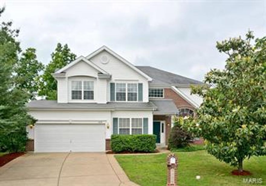 Beautiful 5 bedroom, 2.5 bath home in a quiet cul-de-sac with 3,200 square feet of comfortable living space. Expansive two story entry opens to formal living and dining areas with a T staircase. The two story great room includes a fireplace and palladian windows for plenty of natural light. The spacious kitchen offers a breakfast room, center island, walk-in pantry, and plenty of cabinet space. A main floor bedroom, large office, and a mudroom/laundry room finish off the main level. The upper level boasts the master suite with a sitting room, walk-in closet, and full bath with dual sinks, separate shower and corner soaking tub. The walk-out basement has plenty of storage with full windows and access the covered patio, rear deck, and hot tub pad with electric in place. Other features include zoned HVAC, a two car garage, oversized driveway, and a private lot backing to woods. Don't miss this impressive home!