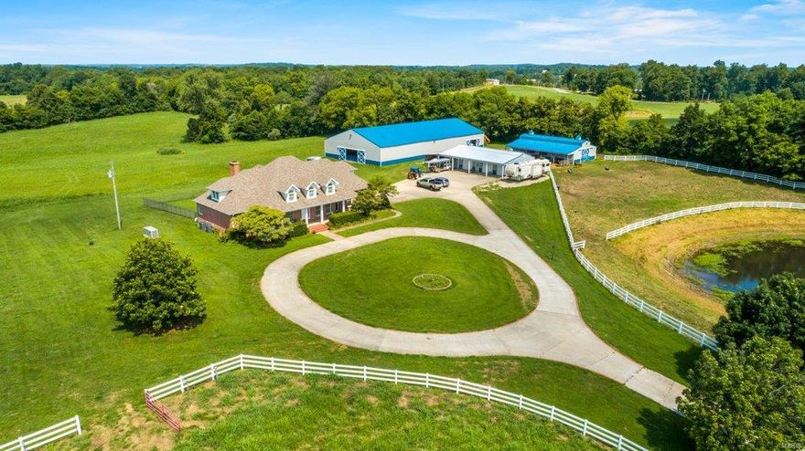 This beauty could be your personal "Southfork" home! Situated on 25.640 unrestricted acres, this equestrian delight features everything you need including a commercial 72x144 indoor riding arena, custom stables with wash bay, stalls, tack room and more. Need a place to store all of your toys?  You'll love having the 4 bar shop with full length covered porch and 24x30 lean too already waiting on you.  The two story, custom brick home features a chef's delight kitchen, 5 larger than life bedrooms, main level master suite, formal dining room, and a full unfinished basement offering lots of room to grow.  The home is situated beyond a driveway lined with mature trees that offer great privacy, and white vinyl fencing.  This home is truly one of a kind, so put this estate on the top of your list to see!  Just 1/2 mile from Jackson city limits. Internet options include At and T as well as satellite.