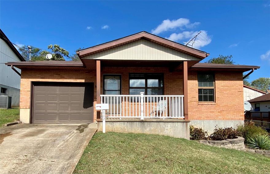 WHAT A GEM!  This full front brick,  2 bedroom, 1.5 bath home features a covered front porch with enough room for a few chairs and a small round table for your morning coffee.  The house has been fully repainted and all the floors are now new vinyl plank flooring.  Open floor plan.  The kitchen refrigerator and stove will stay with the house.  From the kitchen,  there are sliding glass doors that step onto you outdoor patio.   The living room has a coat closet and a new ceiling fan. The master bedroom has two sets of closet doors for a his/her side.  Also down the hall, another bedroom, full bath and a linen closet.  The laundry/mud room is right off the other side of the kitchen.  This leads to the one car, oversized garage.  In the 1/2 bath, you’ll see a doggie door that leads to an enclosed fenced area.  There’s so much more.  The only thing missing is YOU! Additional Rooms: Mud Room