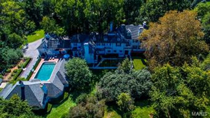 THE PINNACLE OF SAINT LOUIS ADDRESSES! A setting reminiscent of the Hamptons or Martha's Vineyard. A custom-built residence made to withstand time and generations. YOUR SANCTUARY! Ideal for every type of family. This estate of grand distinction is unparalleled for its masterful fusion of elegance and casual charm. Nestled on nearly 2 acres at the epicenter of Ladue, this home hosts nearly 7500 sqft of equal measures traditional and open floor plan. Adding to the allure is a newer guest home offering another 1500 square feet of dedicated and wide open living space with full bath. What could be better for extended stay family, guests or au pair? The residences anchor the private courtyard setting for the in ground pool and patios. English formal and herb gardens add to the tranquility and bounty of nature in every direction. Numerous garage and carport bays allow ease of parking. The current owner's eye for design and superior product have imbued the home with a panache like no other! Additional Rooms: Mud Room