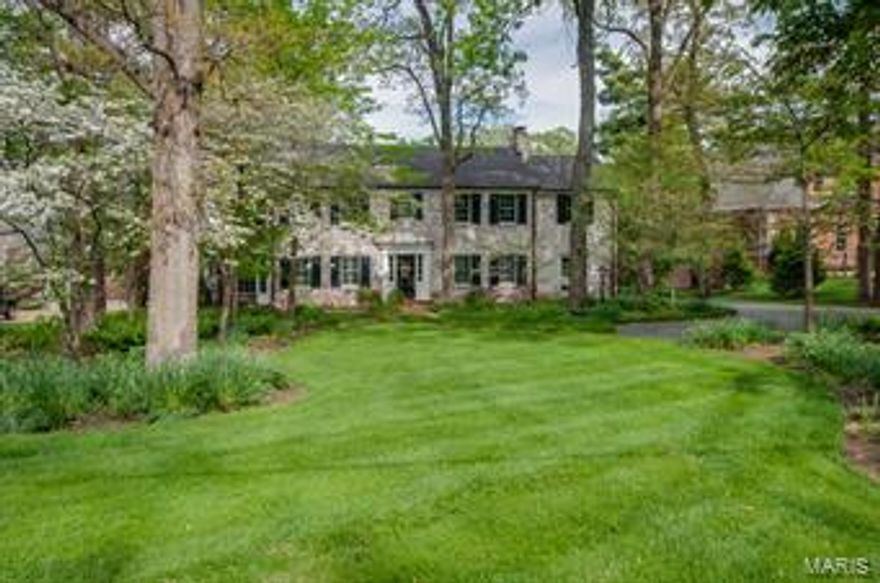 Gracious home on an acre+ lot in Ladue Schools.  Gorgeous park-like setting  with extensive landscaping.   Entry foyer opens to living rm,includes moldings, gas fireplace/mantle, built-in shelves & French doors to flagstone patio. Sun drenched family room w/French doors, built in desk/shelving. Formal dining rm w/bay window, detailed molding.  Light filled kitchen, with 2 islands, Custom WoodMode cabinets, granite,subzero refrig, Viking cooktop, redesigned by the current owners & now includes a breakfast room. 2nd level master ste includes an updated master bath w/his n' her vanities, heated floor, jetted tub,Rainfall shower. Walk-in closets. Vaulted Den off master w/ Palladian window/ built-in book shelves.  3 addtl large bedrooms & 2 baths. 2nd floor laundry. Zoned systems. Professionally landscaped. Wired for sound system. Recreation rm in LL w/wet bar, half bath & storage area.  Great location, minutes to downtown Clayton, airport. See special feature sheet for more highlights.