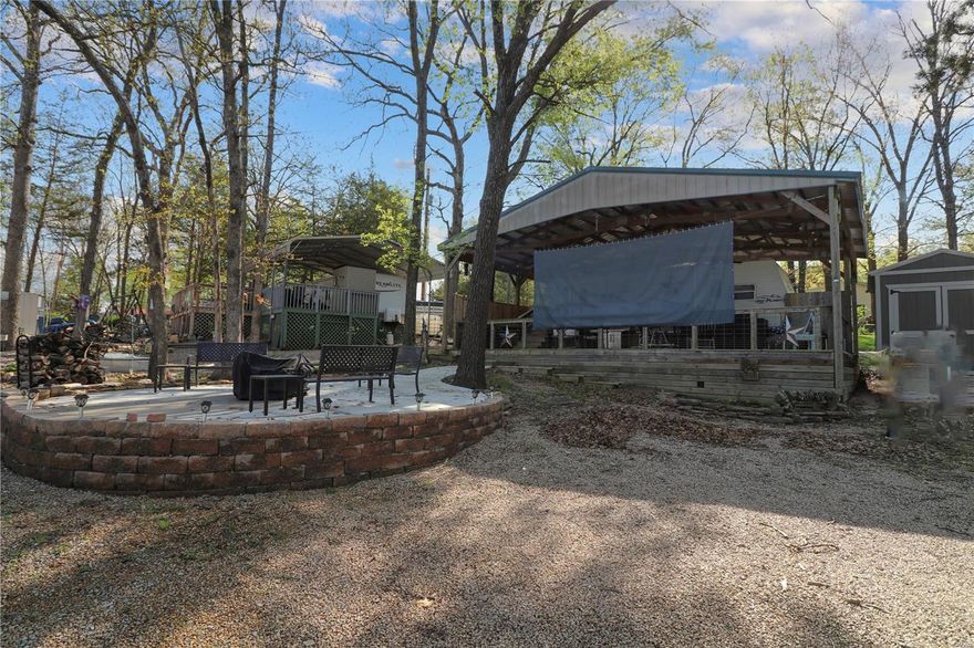 Seller is offering $9,000 off of listing price if property closes by September 30th! Fall camping is right around the corner! Vacation oasis ready for your summer enjoyment in the beautiful private and gated community of Cedar Lake! Property consists of 3 lots next to Suntan Beach.  Improvements include retaining wall, 20' concrete patio, 15x35 Deck, 8x12 storage shed, 24x35 awning over camper and deck and much more! Property comes with well-maintained 2006 Jayco 28' camper, 4 Man Paddle King Lo Pro Angler Pontoon, Fresh water tank, and above ground holding tank for sewer and 50 AMP electric.  Sellers are leaving many items including patio furniture, stainless grill and chairs.  Whether its fishing, swimming or kayaking you enjoy, this property is ready for you!