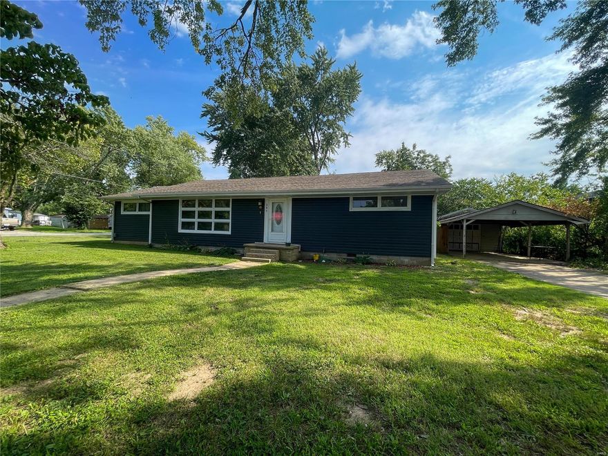 New Price! Spacious Family Home in Prime Location! This 4 BR, 1 BA home boasts 1,534 sq ft of living space & is ideally situated near downtown. The charming refinished original hardwood floors grace the living room, dining room, & 3 of the BRs. Expansive master bedroom offers updated carpet flooring. The bathroom showcases ceramic tile surrounds, a modern tub, vanity, toilet, and ceramic tile flooring. Enjoy efficient comfort with central heat and air, enhanced by a 95% efficient natural gas furnace and a new A/C unit installed in 2013. New water heater. The roof, replaced in 2013 with 30-year architectural shingles, ensures lasting protection. Covered parking is provided by a carport, accompanied by a 1-car garage for additional storage. 110x130 corner lot, the property offers ample space. New vinyl siding enhances its curb appeal, along with the practicality of a privacy fence. Experience the convenience of city living, close to shopping and amenities. Schedule a showing today!!