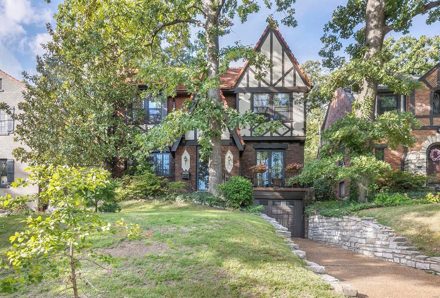 This beautiful 2.5 story Tudor-style home located in the heart of the Alta-Dena Subdivision features over 2500 sq. ft of living space, 4 bedrooms (with a 5th possible on the 3rd floor), hardwood floors throughout the main and 2nd floor, a beautifully updated kitchen with a brand new stainless refrigerator, gas range and microwave as well as beautiful new granite counter-tops and lots of storage.  The front door opens on to a large living room with a wood-burning fireplace and an adjoining sitting room with french doors to the quaint front balcony in the front.  The large dining room opens to back patio and landscaped backyard.  Upstairs, the child's bedroom is directly adjacent to both the hall bathroom and master bedroom and has the potential to be converted into a large master bathroom and additional closet space.  The amazing location is just a short walk to downtown Clayton, the Loop, Washington University and Flynn Park. Additional Rooms: Sun Room