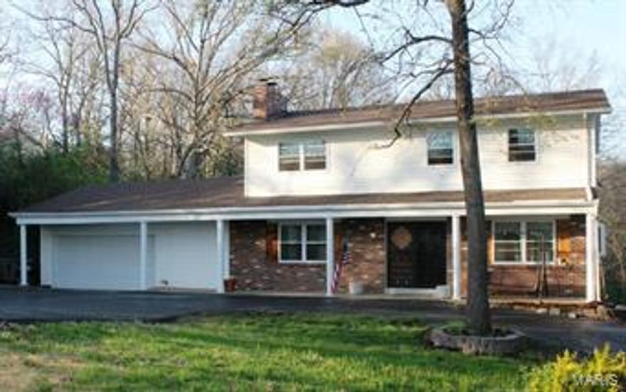 WANT TO LIVE IN THE WOODS NEAR A LAKE yet close to civilization? Are you an outdoor enthusiast who loves kayaking, fishing just a few away? This is your weekend Lake Fond Du Lac...all week long! 4 beds 3 full baths & over 2,000 sqft of living space make this option a no-brainer! 2 car garage w/a pull thru for boat storage, shed, workshop out building, deck w/a beautiful view & above ground pool. Enjoy soaking up the serenity on the private screened in porch! Wood floors thru-out, newly remodeled kitchen w/gorgeous cabinets, backsplash, some SS appliances & a unique pass through to dining area. Cozy up to the fireplace off the kitchen on those cold winter nights too! Finished walk-out basement w/full bath & main floor laundry. Multiple living spaces make this home great for entertaining & it is virtually maintenance free! Buy this house today & you will move in just in time to enjoy Lake Fond Du Lac this summer and the spectacular fireworks display this July 4th.