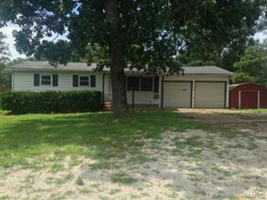 Country home on .69 acres, close to town and shopping.  3 BR with some wood floors.  Central heat and air.  2 car garage. Front and rear porches.  Full basement with access from outside. Nice neighborhood. Backs up to trees and woods.  Some newer tilt-in windows.  Cash or conventional financing, as needs new roof and sheet rock. SpecialListingConditions: Foreclosure