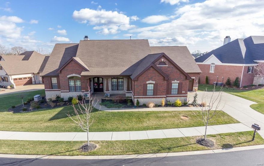 Beautiful Enclave of Bellerive gated community.  Please check the list of extras that were built into this home.  In addition, most of the furnishings will also stay. Fantastic cooks kitchen with top of the line SS appliances, granite counters, upgraded 42" cabinets and planning desk.  Currently a 3 bedroom home and all are en-suites.  Two additional covered outdoor living areas enhance this desirable property.  The finished portion of the LL has plenty of space for the pool table which is remaining also.  The unfinished portion of the LL has a rough-in for an additional bathroom and plenty of space for two or more bedrooms.  The master en-suite is equipped with dual vanities, soaking tub, separate shower and the recent addition of the whirlpool tub.  All 3 bedrooms are en-suites.
The seller is currently offering most of the furnishings inside and outside to remain with the property sale.  Golf enthusiasts there is a 3rd garage for your cart and you can walk to the PGA Championship.