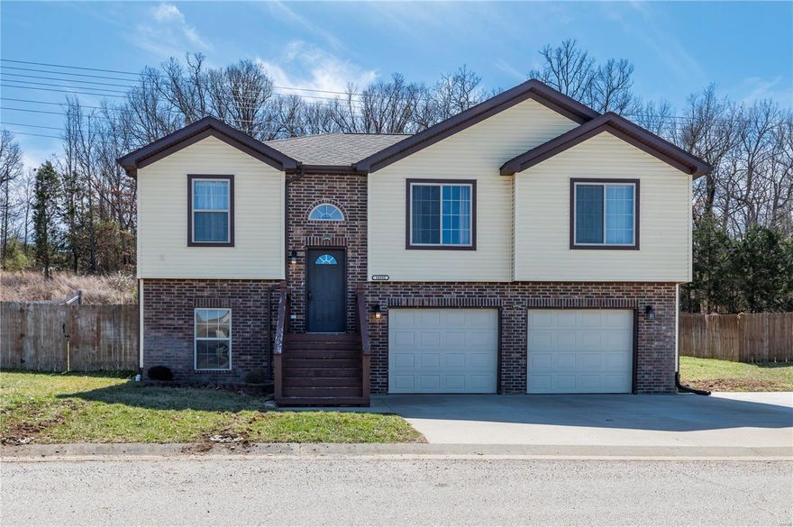 Move-in ready home conveniently located in Gospel Ridge Estates and Waynesville/St. Robert school District. Close proximity to highway access to get anywhere around the area and less than 10 minutes from Fort Leonard Main Gate. Take a look at this beautiful 5-bedroom and 3-bath home. You will be greeted into a living room with vaulted ceilings, next to the kitchen/dining room combo. Kitchen is complete with stainless steel appliances including microwave, dishwasher, stove, and refrigerator. Off the dining room is a sliding glass door that leads to a deck and fully fenced yard. Down the hall from the living room is the primary bedroom with a walk-in closet and en-suite bathroom. Two extra bedrooms, a full bath and laundry room to finish out this level. Lower level has 2 additional bedrooms (1 is non-conforming bedroom) and a full bath. The property includes a storage area, 2-car garage and a nice level driveway for three cars. It is well maintained home with the originals owners.