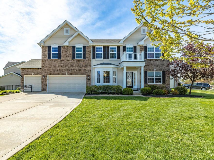 You won't want to miss this beautiful 2 story that's loaded w/ updates! From the moment you walk in you will fall in love with the open floor plan & wood floors. The kitchen is a cooks dream with 42' cabinets w/ pull out shelves, granite countertops & SS appliances, including a double oven. The bay in the breakfast room leads out to a large composite deck & patio area. You can't help but notice the gorgeous landscaping with newly installed fence. The massive master suite is a great place to relax at the end of a long day. There are 3 more bedrooms each w/ its own walk in closet. Other features include: 9 ft ceilings, recessed lighting, whole house surround sound and surge protector, newer SELF CLEANING WINDOWS, gas fireplace, 3 car garage...the list just goes on & on. This is the perfect neighborhood with its pool, ponds, clubhouse, trails & an elementary school at the front of the subdivision. Located in Zumwalt West. New roof on its way!