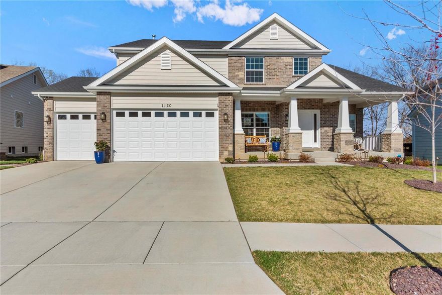 This spectacular McBride-built 1.5 Sty features best-in-class upgrades, fixtures & amenities including soaring ceilings, contemporary lighting & wide plank hickory flooring that extends throughout the main floor. Located in the premier Chesterfield community of Fienup Farms. Impressive 2-sty entry foyer leads to formal living room, striking great room with Carrara marble fireplace & dramatic wall of windows with private wooded views and adjacent dining room with quartz bar & sliding glass door that opens to deck. Culinary enthusiasts will love the designer kitchen with quartz countertops, transom cabinets, stainless steel appliances & 8’ center island. Spacious primary bedroom suite with wide bay window & luxury bath with freestanding tub & walk-in shower offers an appealing retreat. The 2nd floor extends the living quarters with 3 additional bedrooms, 1 with ensuite bath, & 2 with Jack n’ Jill bath. Situated on a premium cul-de-sac lot with deck, stamped concrete patio & 3-car garage.