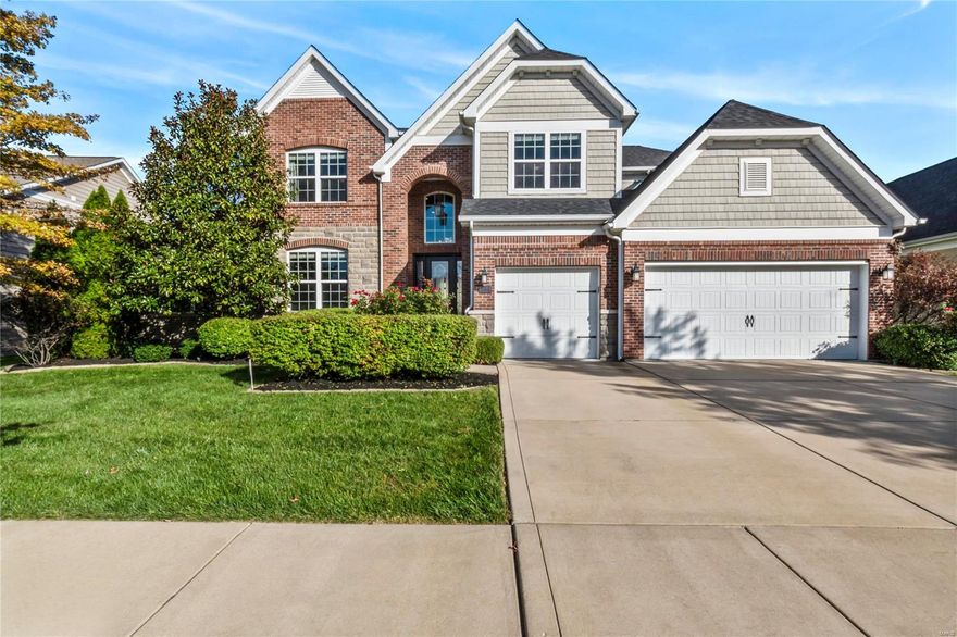 Stunning 1.5 Story home in desired Reserve at Chesterfield with 5 beds & 4.5 baths and approx. 6000 sq ft of living area to enjoy!  The beautiful foyer invites you in w/tall ceilings trimmed with crown molding & perfect well-lit office space. Gorgeous Engineered Walnut Wood flooring leads you into a 2 story living room w/an abundance of natural light from the gleaming floor to ceiling windows & see thru stone gas fireplace. Gourmet kitchen w/custom cabinetry, top tier granite & SS appliances! Exceptional Master Bedroom suite has a sitting area w/coffee & mini bar and luxury bath.  Large main floor laundry & utility room offers storage lockers & planning area. Expensive upper-level has 3 beds w/California designed closets, 1 en suite & 1 Jack & Jill bath, playroom, & loft area. Huge finished basement w/5th bed and full bath.  Oversized 3 car garages w/electric vehicle charging station. Built-in speakers throughout the house with Sonos system. Roof 2022.This house has so much to offer!