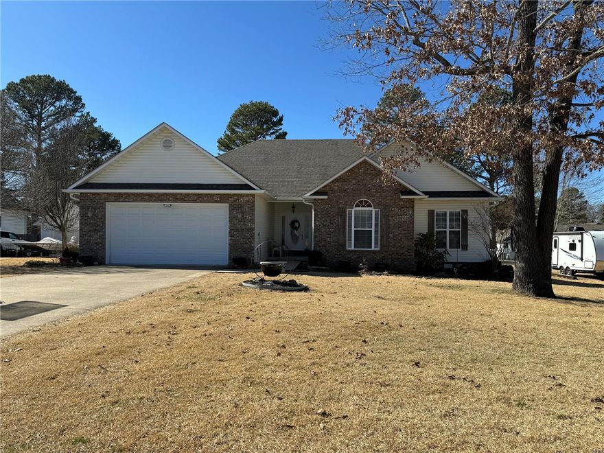 Beautiful 3BR/2BA home with stylish appointments in the highly desirable Still Creek Crossing Subdivision.  This home features a master suite with walk-in closets, dual sinks, and walk-in tile shower.  The open floor plan kitchen has an island bar, perfect for entertaining, with a separate dining area for more formal gatherings.  Upgraded appointments include custom millwork and a beautiful fireplace with vaulted ceilings in the family room.  Additional features include an attached garage with extra storage space above and a screened back porch with ceiling fan, perfect for all season morning coffee or an afternoon wind down.  An enclosed backyard with brand new fencing and Award Winning custom landscaping complete the curb appeal and outdoor space.  This home is located just minutes from schools and shopping, off Oak Grove Road in Poplar Bluff.