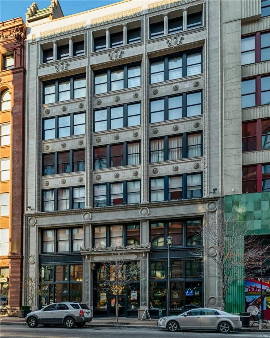 Welcome to Unit 607 in Dorsa Lofts! Located in the heart of The Washington Ave Loft District, this exceptional loft is exceedingly customized and no detail has been left unnoticed.  As you enter the large living space you will be greeted with panoramic views of downtown. Three walls of expansive windows make this loft one of a kind. Exposed brick, Wood Fir Ceilings, & nearly 1,600 sq ft of open concept living space provide the downtown loft experience you are looking for.  Impressive kitchen features an abundance of Cherry finish cabinetry, stainless appliances, & oversize breakfast bar.  The huge master features Custom Dual Closets and spacious master bath. Private half bath for guests & large laundry room finish off the incomparable loft. The unit includes TWO side by side parking spaces located on the FIRST LEVEL of garage, both spaces are able to accommodate a lift creating space for FOUR cars. Enjoy patio weather on the amazing rooftop deck or hit the building's private gym! Location: Downtown