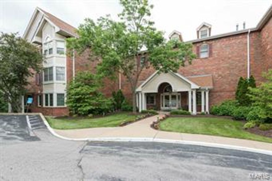 This 2 bedroom, 2 bath garden condominium in the Villas at Golfview is a a cut above the rest.  It has generously proportioned rooms and a great design that feels spacious and luxurious.  There is a laundry room in unit, lots of closet space, and an eat-in kitchen with breakfast room & desk. The master suite includes a large bath with separate tub & shower and a walk-in closet.  Triple windows in the living room pull natural light into the space.  Formal dining room space is large - could be converted into a family or TV room - use your imagination.  This is an exclusive community with high standards of quality.  Storage is inside and just down the hall in a finished common space.  Parking is under ground with an elevator to all levels. The light filled lobby is a great place to greet friends.  In-ground pool between the two buildings; common gathering room on the third floor. Some Accessible Features Location: Suburban, Upper Level