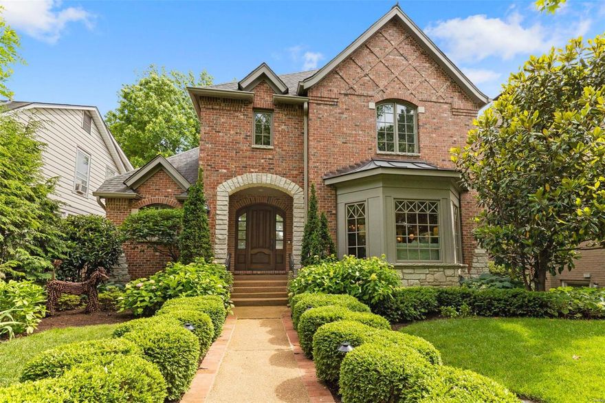 Nothing was sacrificed in this magnificent Clayton home! The views are uniquely quiet & lush and the quality is truly astonishing.  Current owners thoughtfully worked together with architect Lauren Strutman to design this entirely brick home as a traditional oasis balanced with the proximity to parks, restaurants & all you wish to experience. Nine-and ten-foot ceilings abound & large rooms provide flexibility & family comfort while the materials & workmanship are supreme. Spectacular Kitchen with inset cabinets & over the top designer appliances opens to café area, hearth room, entertainment area & custom laundry/mud room. Ethereal views from one of a kind screened porch & patio. The lower level includes a temperature-controlled wine room, rec area, movie space, multiple egress windows, & bedroom with ensuite bath. The Carriage House is not to be missed as it could be a guest suite, office, or playroom. Meticulous condition throughout. Abundant storage & closets-Simply unique & divine! Additional Rooms: Mud Room, Wine Cellar