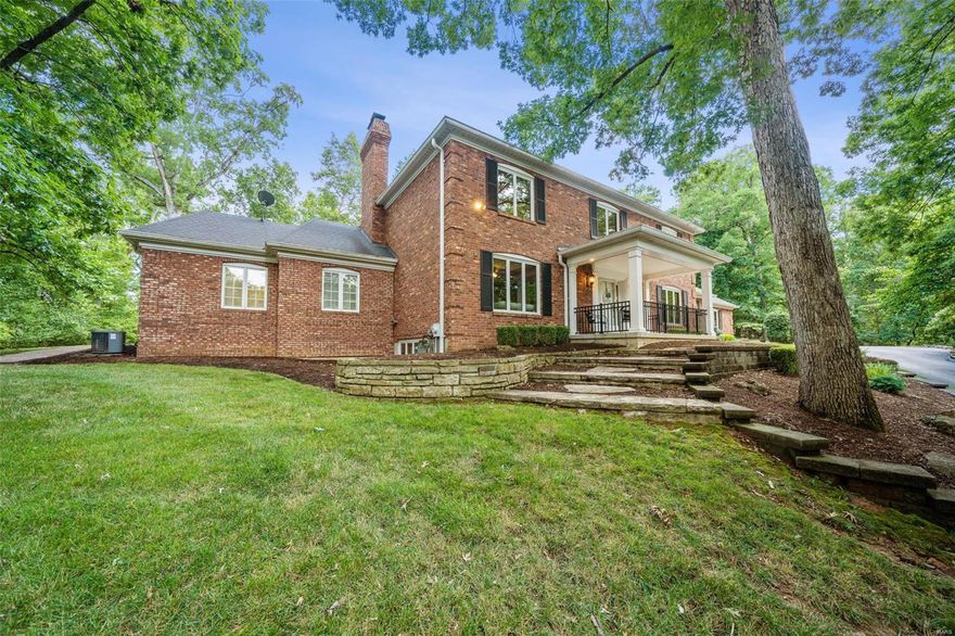 Don't miss this private mini estate setting in "close in" exclusive gated Chesterfield Lakes community in Chesterfield. Total privacy & exclusivity, many trees. OVER 4,800 SQ FT! Large patio & second covered patio. Custom built 1.5 story home with two large primary suites; one on 1st floor with adjacent office/den/sitting room with fireplace; another master suite on second floor. Both primary suites feature a large bath and walk-in closet. Custom finishes include beautiful crown & dentil moldings, tray ceiling, built in book shelves, brick fireplace, shutters, window trim moldings. Great kitchen—center island w/cooktop, double ovens, built in microwave & windows overlooking the wonderful yard and patios. Enjoy the finished lower level with a recreation room, exercise room, half bath and plenty of unfinished storage space. Truly a retreat on 3.6 acres with the added benefit of a location convenient to Chesterfield Valley, schools & highway.  Neighborhood has two lakes & tennis courts.