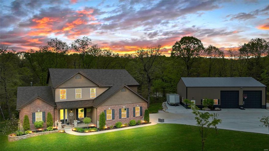 Enjoy the bright natural light reflecting off the solid pecan wood floors that grace the main level living area of this home are sure to impress. The large master suite, kitchen w gorgeous designer pantry and hearth room, plus a giant laundry room! The upstairs boasts the perfect loft area with 3 huge bedrooms. The finished w/o basement features a bedroom, full bath, wet bar and large multipurpose rec room. Something for everyone: Acreage, beautiful finishes & a MASSIVE outbuilding! Play/work in the 40X60x16 insulated outbuilding offering a 5" thick concrete floor, industrial lighting, 200amp service w/50amp hookups for a welder or RV, finished plumbing, Furnace and Air conditioned, & 14ft insulated doors with electric openers. Finally, the amazing outdoor spaces: A covered deck, aggregate patio wired for a hot tub & 3+/- private acres. There is a perfect spot for an inground pool! Seller is motivated!