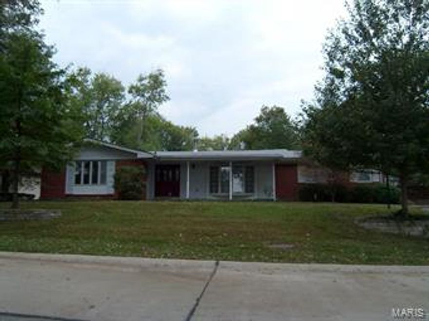 Nice mostly Brick Ranch in Sunset Hills!  Wood Floors throughout entire Main Level and tile in updated bathrooms.  Kitchen offers Stainless Appliances, large work areas  of a solid surface and at the Breakfast Bar & Center Island.  A good amount of cabinet space, drop lighting and can lights offer you many options along with the slate tile flooring.  Family Room offers nice wood flooring and a Wood Burning Stove.  Newer A/C System, Roof replaced in 2013, Rear Entry Garage with extra space to turn-a-round and ample parking.  Ceiling Fans in most rooms, All Wood Flooring either replaced, refinished or newly installed.  Sellers are offering a 1-Year Home Buyer 2-10 Warranty with a $75 deductible.  Laclede Gas inspection completed.  Sunset Hills Occupancy completed.