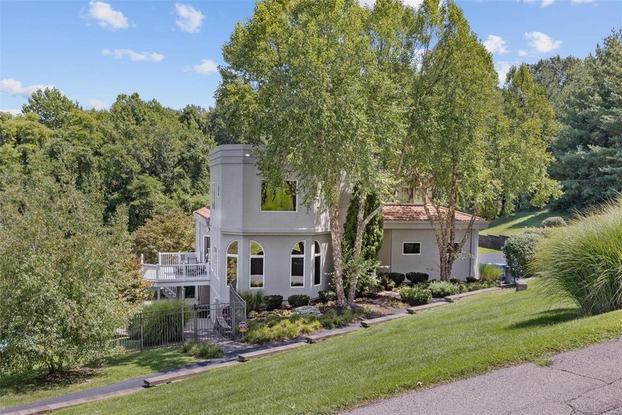 California Dreaming!  This Majestic Modern Masterpiece awaits you in the highly coveted and private Riverscene Estates. Immerse yourself with this masterfully customed-designed Modern Home, inviting the outdoors in with captivating views of the Spirit of Stl Airport and beyond! Replete with luxury custom details, this 4 bed |3.5 bath home is complete with endless entertainment opportunities. We mustn't forget the over-sized 3 car garage! The wall of windows provides natural lighting throughout this open concept home. The upper floor features a Spacious, Master Bedroom Ensuite plus 3 additional over-sized bedrooms. The walk-out lower level boasts a sleek custom bar, recreational area, and gym area (could easily create a 5th bedroom), along with plenty of unfinished space which is sure to please! The 3 acre Outdoor Oasis includes a stunning pool, hot tub, all complete with mesmerizing views created from nature.  This exclusive Contemporary Retreat offers privacy and opulence throughout!