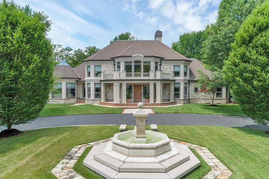 Enter the gates to this Exquisite Home! Stunning French fountain & meticulously maintained gardens! Stately 1 1/2 Story Home offers a fabulous Open floor plan/lavish details/handcrafted white oak millwork/solid wood doors/arched doorways/soaring ceilings/accents from the Busch family estate & an abundance of windows to bring in the natural light. Superb quality radiates upon entry into the grand foyer w/its open staircase, upper loft &open to the Dining Rm, Den & incredible 2 Sty Great Rm w/its wood floors,stunning fireplace & built-in bar. Spacious Kitchen offers slate tile floor, high-end appliances, granite countertops on beautiful custom wood cabinetry & adjoins the huge Breakfast Rm.Flanking the Kitchen/Breakfast Rm is a stunning Hearth Rm w/beautiful fireplace, wood floor,gazebo beamed ceiling & Sunroom w/ flagstone floor, transom windows & French doors to the lg Flagstone patio that overlooks the stunning,park-like outdoor paradise. Additional Rooms: Sun Room