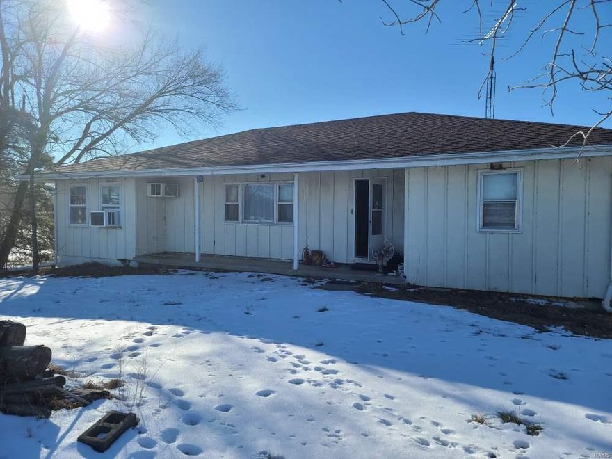 House 3 acres Sullivan - 3 bedroom ranch home on full unfinished walk out basement with wood stove. Has 1  bathroom and 2 half baths. 38 x 50 - 4 car garage with loft for storage. Barn could be used for equipment, livestock or storage. Subject to final survey.