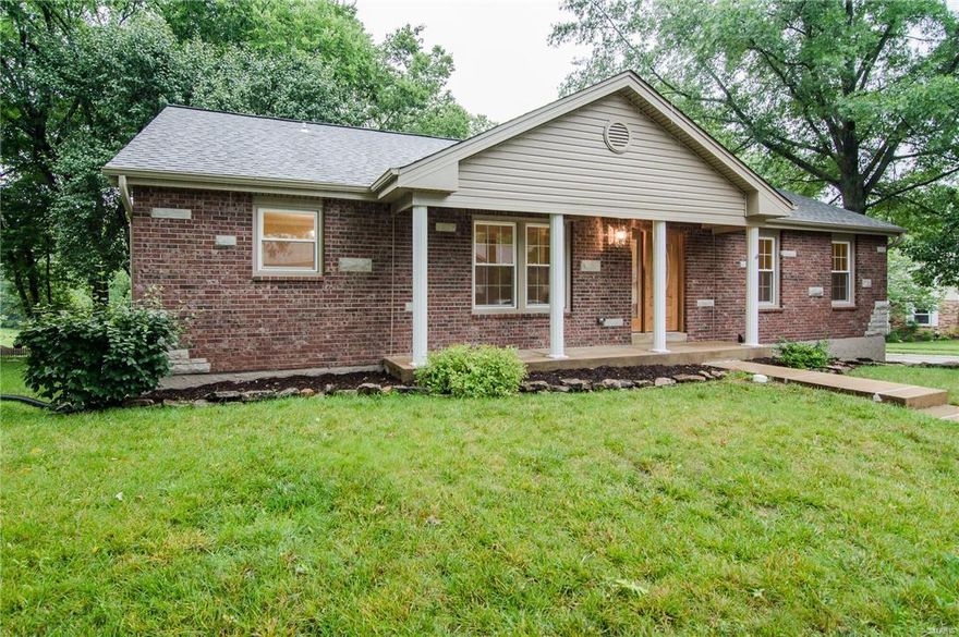 Like new property in a great neighborhood.  Totally restored 5 Bedroom 3 full bath home.  New everything is in the interior of this home.  New carpet throughout.  New kitchen that features custom cabinets, granite counter tops, under mounted sink, top of the line stainless steel appliances with a gas cooktop and a duel fuel oven/convection oven with warming drawer, ceramic tile flooring and a breakfast room w vaulted ceilings.  Separate formal dining.  Large family room with wood burning fireplace and vaulted ceilings.  Main floor master suite with private full renovated bath.  Three extra bedrooms on the main.  Lower level features the 5th bedroom above grade with a full bath and a rec room.  THIS ONE WILL NOT BE ON THE MARKET LONG!!