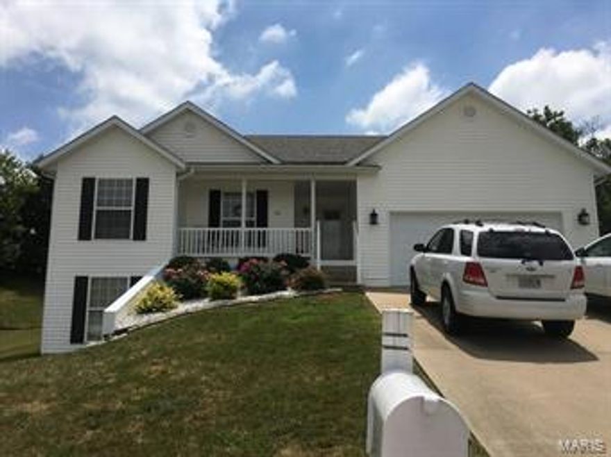 Move in Ready! ** 4 Bedroom, 3 Bath Ranch ** Gas (vented) Fireplace ** ALL Kitchen Appliances Stay ** Tiled Back Splash * Tiled Baths ** Tiled Laundry:  main Level * Master Bath: Double Sinks ** Master: Walk-In Closet ** Wood Flooring: Living Room ** Dining Area walks out to deck and tree lined backyard ** Spacious mostly finished walk-out Lower Level: ** Large Family Room, Bedroom and Bath, Plus Storage. **