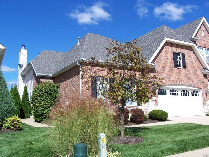 Elegant villa in Kingsgate Village - Winghaven.  Former display loaded with upgrades --10' ceilings, coffers, crown molding, custom cabinets and much more. 2 fireplaces. come enjoy the carefree lifestyle.  spotless and ready - quick availability!  The “Seller is offering to pay 1 year of HOA dues”