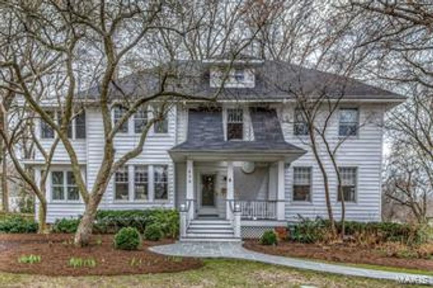 Webster at its best! Once the country home for Ralston Purina this 2 1/2 story Century Home has the best of both worlds. The architectural details of handcrafted woodwork, tall ceilings, French doors, built-in butlers pantry, window seats & sunny porches reminds one of bygone days. Updated to meet todays standards with newer roof, siding, windows, plumbing, electric service & energy efficient HVAC. A gracious open foyer welcomes you with a beautiful staircase & opens to elegant formal living room & dining rooms. The spacious family room features a wall-to-wall custom media center & bookcases & provides easy access to the enormous wrap around deck. The bright & open kitchen is equipped with professional appliances, large center island, planning desk & breakfast room overlooking the beautiful yard. The master suite has its own private sitting room, fireplace, huge walk-in closet & luxury bath. Additional spacious bedrooms with organized closets make this a perfect family home.