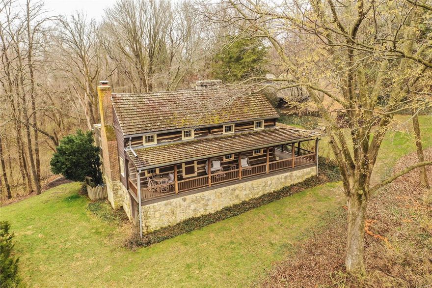 The perfect weekend retreat: Riverwoods! Every minute spent in this 1830 RESTORED LOG CABIN will cover you with joy. Moved from its original location in Hermann stone-by-stone and timber-by-timber then rebuilt exactly so, and placed on a solid concrete foundation. Also included is a cozy apartment below the garage, and TWO ADDITIONAL RESTORED LOG CABINS! Modern amenities combine with real Missouri history, to provide the perfect blend of old world charm and convenience. Sitting on the ridge overlooking the river bend this compound offers amazing views inside and out. The interiors are rustic and most pleasant. Enough sleeping rooms for large families or numerous guest, maybe even ABNB. Imagine special evenings in front of original stone fireplaces or the wrap-around porch or the huge flagstone patio. In three parcels that total about 8 acres stretching from the road to the river manicured lawns, awesome walking paths hundreds of plants and trees with ID tags, and a two car garage. Additional Rooms: Mud Room