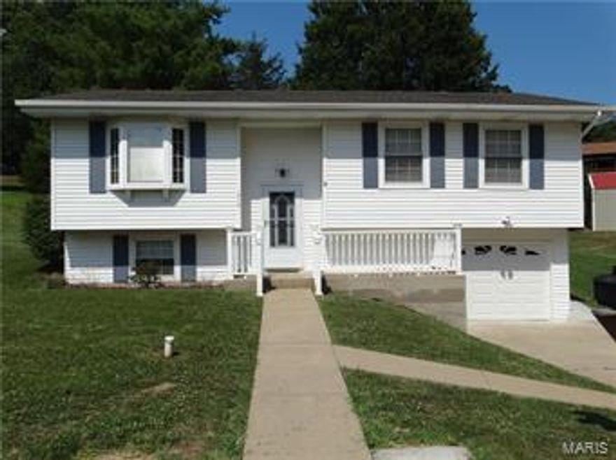 Back on the Market....Buyer's lost financing! Motivated Seller! This home is really worth a look!!! Super Cute updated home on a large lot on a dead end street. Large living room with bay window. You will fall in love with the updated kitchen with lots of cherry 42" cabinets, glass back splash and all newer appliances that stay including the refrigerator. The kitchen walks out to the backyard patio. Main floor bathroom is updated and GORGEOUS!!! It features lots of cabinets, double sink and a spa shower with jets. Master bedroom has his and her closets. Bedrooms are good size with big closets. Finished lower level with family room and half bath. Move in ready, with updated kitchen, bath, flooring, 6 panel wood doors, new heat pump and a/c unit, roof only a few years old. There is plenty of extra off street parking for all your extra toys. 13x10 utility shed. Don't miss out on your change to see this one!