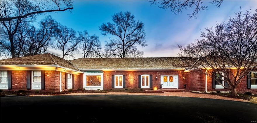 Marvelous 1.5 story estate situated beautifully on 3 acres on a prime, Ladue lot. Effortless flow from the grand living room and dining room offering beautiful leaded glass windows and ornate moldings. The updated kitchen/breakfast rm with large picture window includes a center island, gorgeous cabinetry, chic mosaic-tile backsplash and glass cabinetry all pairing perfectly with the stainless appliances and granite counters. Off the kitchen is the perfect mudroom/utility area including full bath. A handsome FR offers rich wood paneling, fireplace, and adjoins the cozy den. Relax in the main-floor MBS with an upscale bath featuring heated floors and a free-standing tub. The UL includes 4 beds with 2 jack-and-jill baths and storage galore. Rec area, family room, another full kitchen, an ensuite bedroom and pool bath in the walk-out LL with access to the private pool. Striking updates throughout this impressive home offering so much, all in a dream location; a must see to believe! Additional Rooms: Mud Room