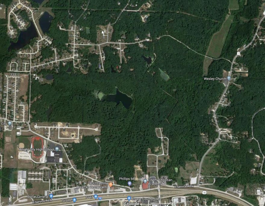 SPECTACULAR piece of land approximately a mile from Wright City/Hwy 70 Exit. 
123.4 gorgeous wooded acres that could be parceled out into residential lots surrounding a beautiful 9 plus acre lake. The possibilities are endless, recreational farm for your family that is quick and easy to get to, stunning getaway for company retreat or just your own private getaway for hunting/fishing/camping. The lake is loaded with fish (Large mouth bass/blue gill/green sunfish) and is secluded within your own wooded paradise. 
A portion of this property is located within Wright City limits with both sewer and water access. Electric and phone are also on property but need to be connected.
This property is a total of 4 lots:
Lot 04-16.01-1-00-003.000.000 - 40 acres
Lot 04-16.0-2-00-009.000.000- 42.54 acres
Lot 04-16.0-4-00-003.0000.000 - 0.6 acres
Lot 04-16.0-4-00-003.002.000 - 40.26
Truly a remarkable piece of Real Estate for one lucky buyer!
* More pictures to come soon!!