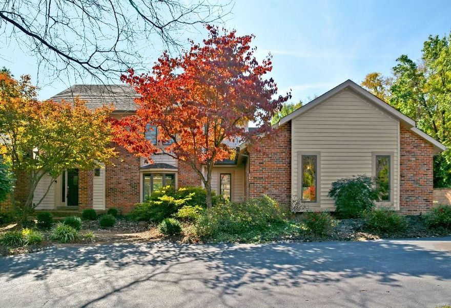 Enjoy this wonderful BRIGHT/OPEN/SPACIOUS home, totally RENOVATED on the mn flr! Beaut 2sty Foyer. Fabulous Great Rm w/ HANDSOME dark, cherry flrs and 2sty WALL OF WINDOWS, overlooking INFINITY POOL & private BACK YARD OASIS! The beaut cherry floors extend into Din Rm, Study, & Mstr Bdrm Ste. The Kitchen features 29ft of upper & lower custom WOODMODE cabinetry, elegant SATURNIA counters, HIGH-END stainls applncs, & beautiful 1'x2' rectangular tile flooring. The Mstr Ste features H/H w-i closets, & a luxury Mstr Bth w/ H/H vanities, GRANITE, separate tub, heated flr, & 7ft FRAMELESS SHOWER w/custom tile. The upper lvl features 3 bdrms; 1 w/vltd ceil & private bth; 2 bdrms share jack'n jill bth. Newer carpeting runs thruout 2nd flr. The LL features: Bar/Rec Rm; Hearth/FamRm; Bdrm; Workout Rm; Full Bth; & oversized SAUNA. This house is completed by its fabulous infinity pool amidst 1+ AC WOODED PRIVACY! AHS WARRANTY includes pool. Other features: 3-car gar; central vac; and alarm sys!