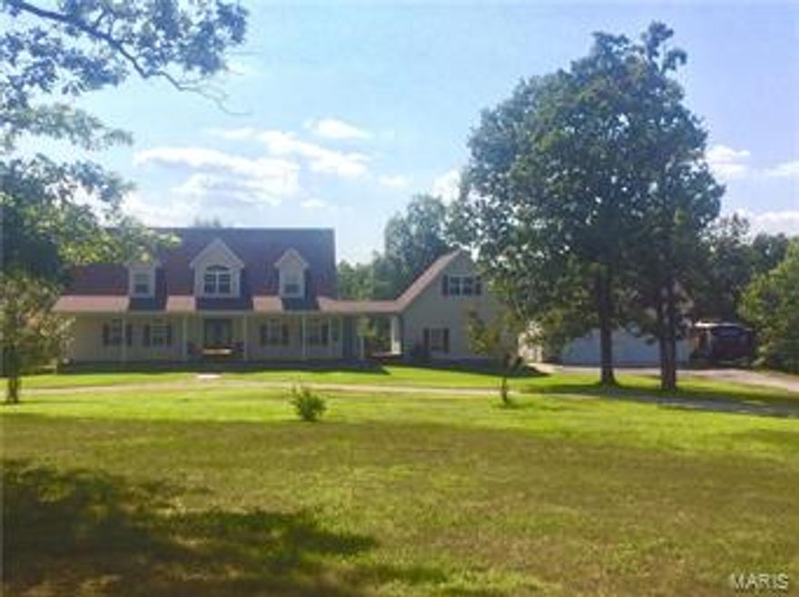 LOOKING FOR SECLUSION CLOSE TO TOWN & POST ? BEAUTIFUL COUNTRY ESTATE HOME ON 10.2 ACRES. THIS 4-5 BEDROOM 3.5 BATH RECENTLY UPDATED HOME OFFERS A BEAUTIFUL VAULTED LIVING ROOM WITH BUILT IN BOOKCASES & GAS LOG FIREPLACE. GREAT SCREENED IN PORCH OVERLOOKING YOUR POOL.  THE KITCHEN OFFERS STAINLESS APPLIANCES, GRANITE COUNTERS, A FORMAL DINING ROOM PLUS EAT IN KITCHEN WITH A TABLE AREA, MAIN LEVEL MASTER SUITE W/WALK IN CLOSET, TILE SHOWER PLUS A CORNER JETTED TUB. THE LOWER LEVEL HAS THE PERFECT ENTERTAINING AREA WITH A WET BAR, GAME ROOM, THE SECOND MASTER SUITE WITH JETTED TUB & WALK IN SHOWER.THE SECOND LEVEL HAS TWO VERY LARGE BEDROOMS WITH GREAT STORAGE.  THIS WONDERFUL PROPERTY HAS A LARGE GARAGE WITH A HOBBY -OFFICE AREA, A DETACHED 29X34 GARAGE WITH 220V  AND  RV HOOKUP. SAVE ON HEATING BILLS AND USE THE HARDY WOOD STOVE SET UP FOR THE HEATING SYSTEM & HOT WATER HEATER. NEW CABINETRY, HARDWOOD FLOORS, PAINT, COUNTERS & CARPETING.
 THIS IS A SHOWPLACE !!  NEW SHINGLES 2016 Additional Rooms: Mud Room