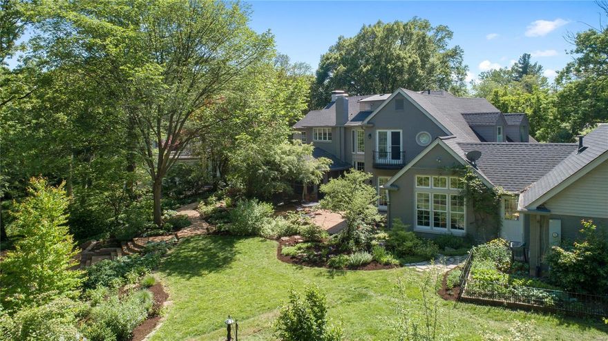 Never before offered to the public, this enchanting 4 bedroom, 4 1/2 bath home is a welcome oasis for today’s busy lifestyles.  With its exquisite pool, gardens and meandering paths with bridges, this property is perfect for both entertaining and quiet family time.  Find a formal living room with fireplace, dining room with large bay window, den/office with built ins, lovely screened in porch with views of the backyard.  The spacious updated kitchen with breakfast area flows seamlessly into the family room.  A mudroom, guest powder room and private bedroom suite are also found on the first floor.  The second floor offers a master suite with sitting room featuring a large bay overlooking the backyard, walk in closet, luxury bath and a private balcony for taking in the serenity of the property.  2 more bedroom suites and laundry are also found upstairs.  All of this, the Ladue SD and more make this the perfect place to call home. Additional Rooms: Mud Room