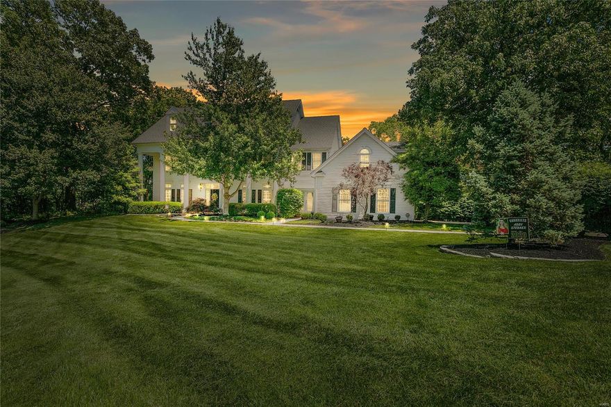 Stunning 5 Bd, 4.5 Bth former display nestled on 2+ private acres! Highlights include: inviting Entry w/gorgeous chandelier, Office & formal Dining Rm w/gorgeous wood moldings. Stunning hardwoods flow throughout most of the 1st & 2nd floors, transom windows, barrel-vaulted passage & see-through stone FP connects the Family Rm & 2sty Hearth Rm. Sensational Kitchen w/breakfast bar, granite counters, 42" cabinets, high-end SS appliances; & large 3 Seasons Rm. Main Flr Laundry/Mudroom w/lockers & 2 half Bths. Stunning Master Ste w/gas FP, recently-updated Master Bth w/gorgeous tile work, jetted tub & dual walk-in closets. 3 add'l Bds, 1 ensuite & others share Jack & Jill Bth. Bonus Rm perfect for a child's toy room or teen hang-out space! W/O LL w/Rec Rm, hobby space/exercise area, Bd & Bth. 3-zoned geothermal HVAC, 2 WHs, sprinklers, cased arched doorways, 3-car side entry garage & alarm! Enjoy 2 neighborhood pools & minutes to Chesterfield Valley shops & restaurants!